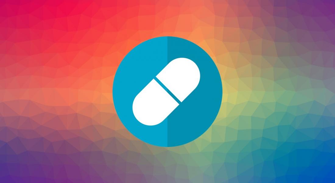 Imagen de una píldora sobre un fondo multicolor